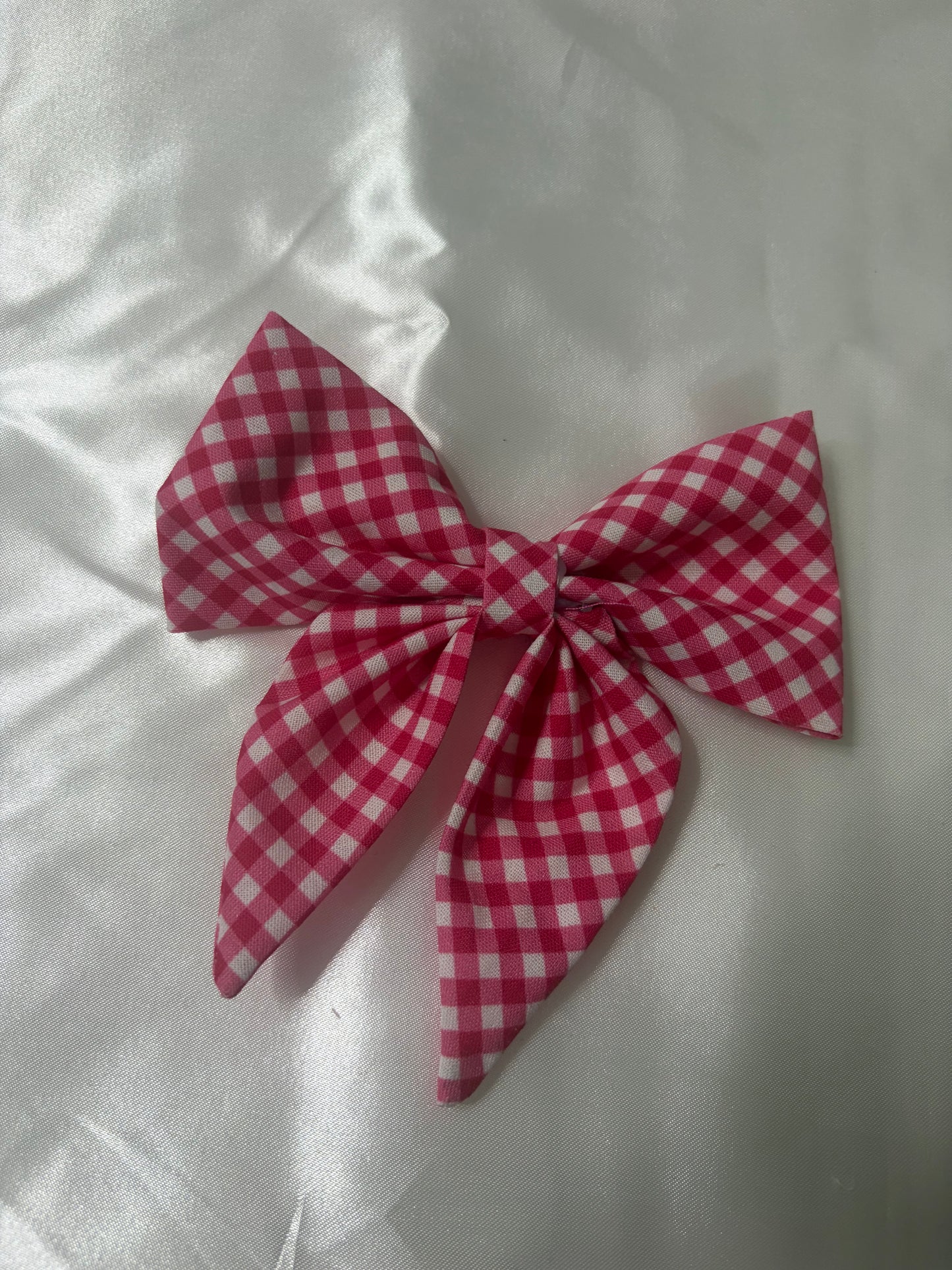 Pink checkered bow